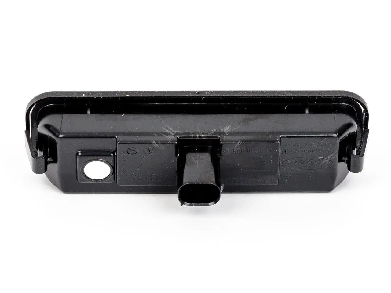 Lampa oświetlenia tablicy rejestracyjnej do Ford Focus MK3. Gotowa do wymiany żarówki.
