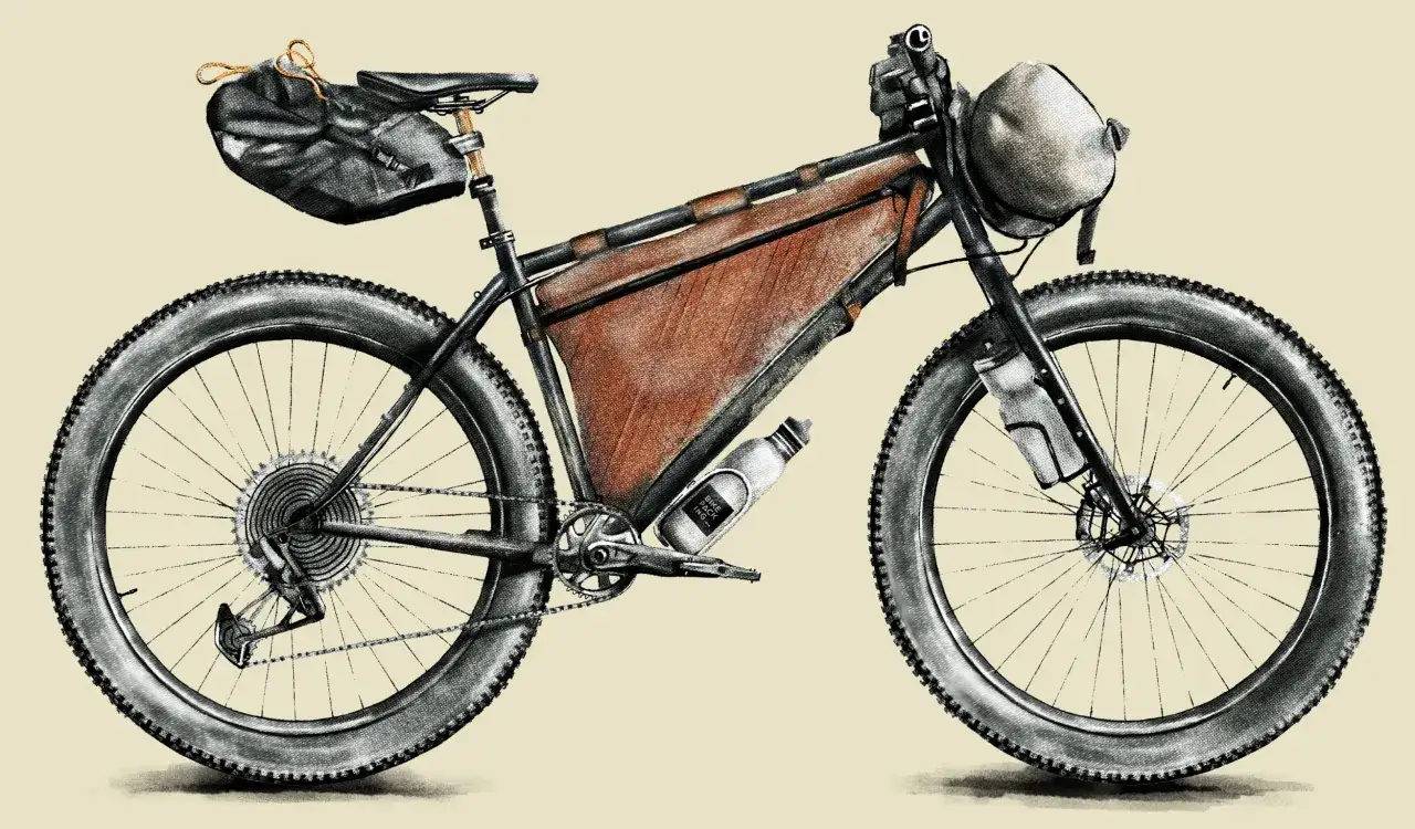 Rower górski z sakwami i torbą podsiodłową, gotowy na przygodę w stylu mtb bikepacking.